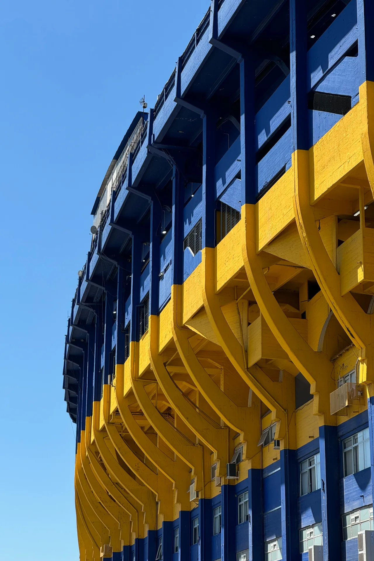 Painted blue and yellow tiers of La Bombonera stadium