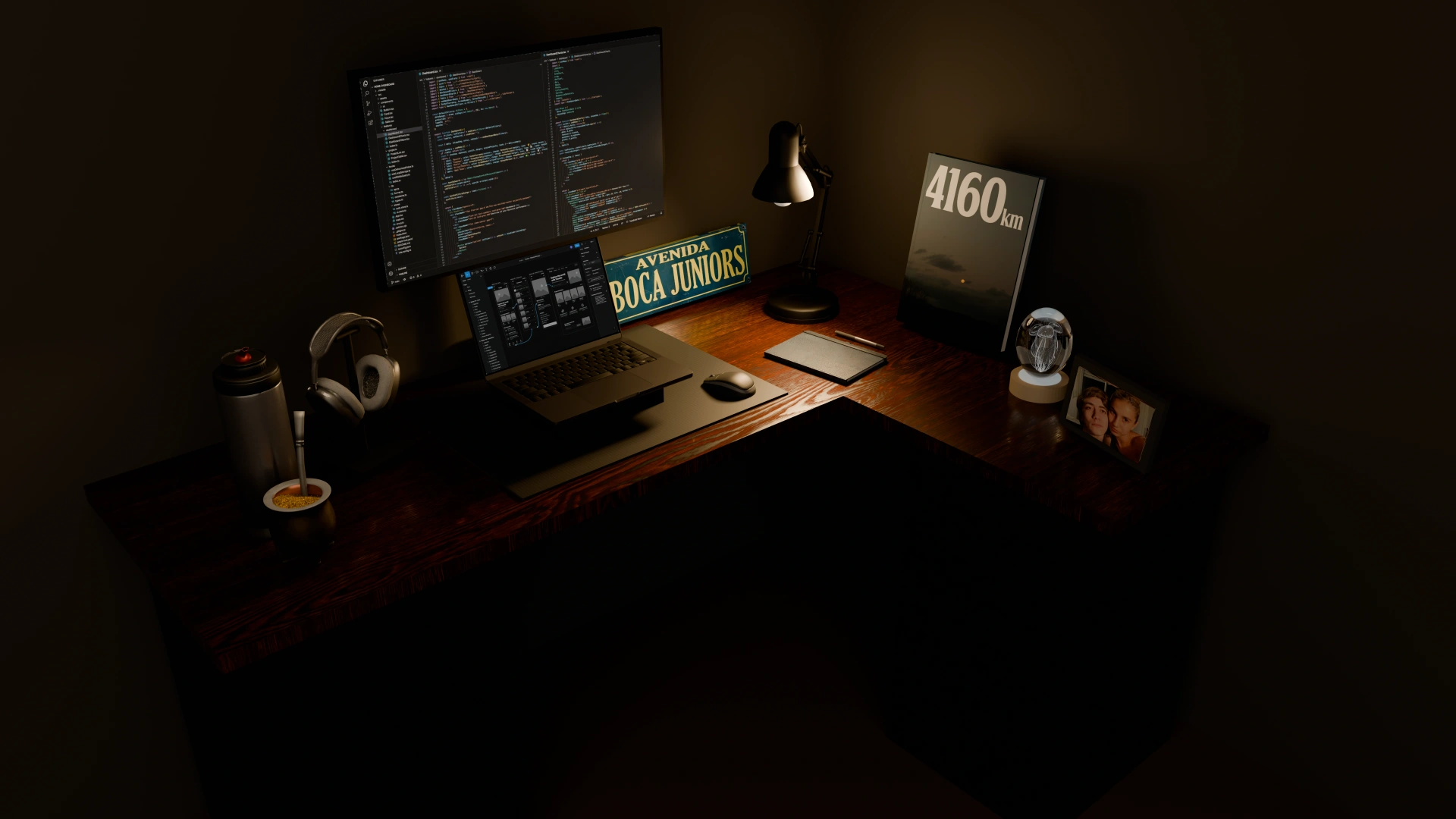 Facundo's desk at night, lit by a single lamp