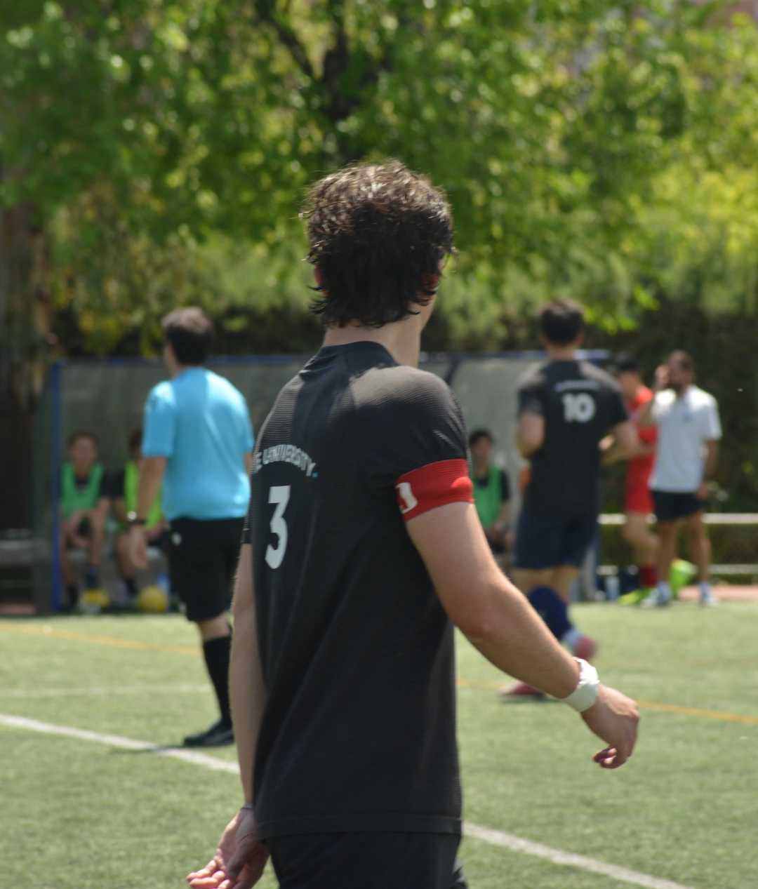 Facundo on the pitch in IE University kit, number 3, captain's armband